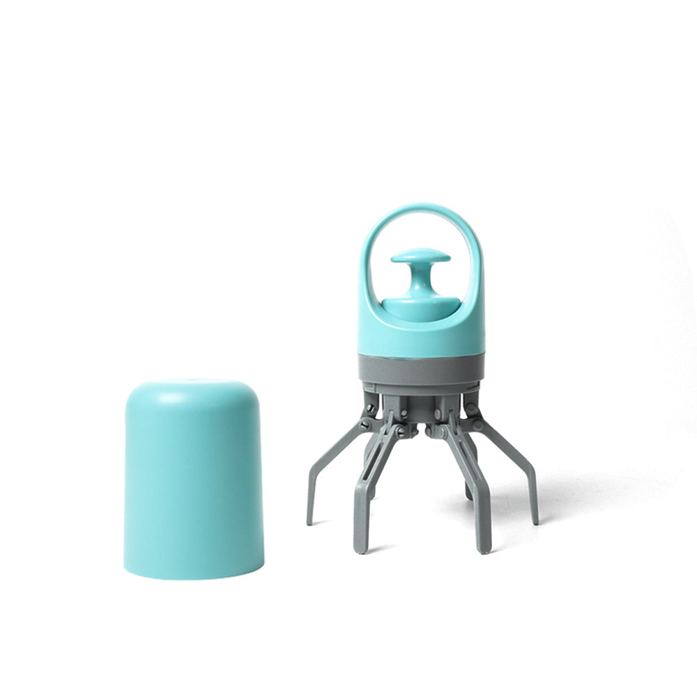 Blue dog pooper scooper with the cover removed and the six claws open